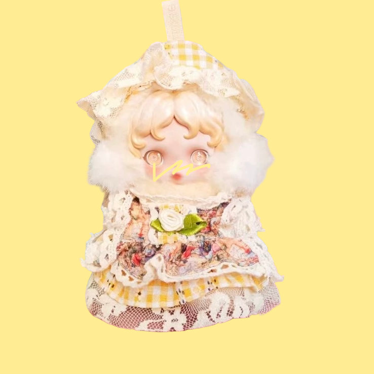 Detailed doll with floral dress and lace details on a colorful background